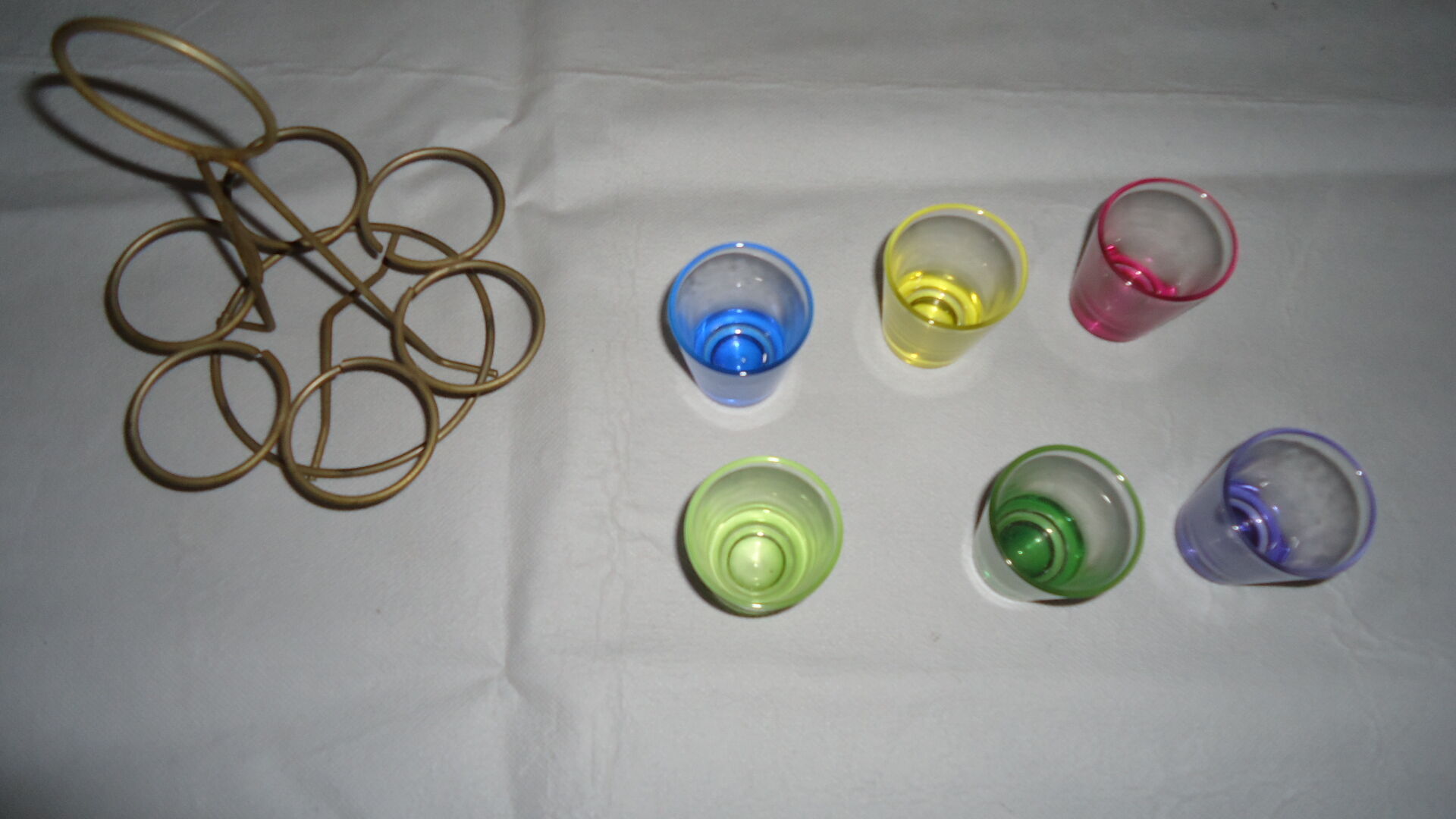 Liqueur glasses on vintage stand