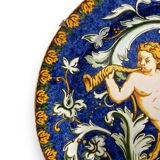 Large italian earthenware dish with putti decor in the taste of urbino