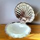 Shell-shaped butter dish in stainless steel