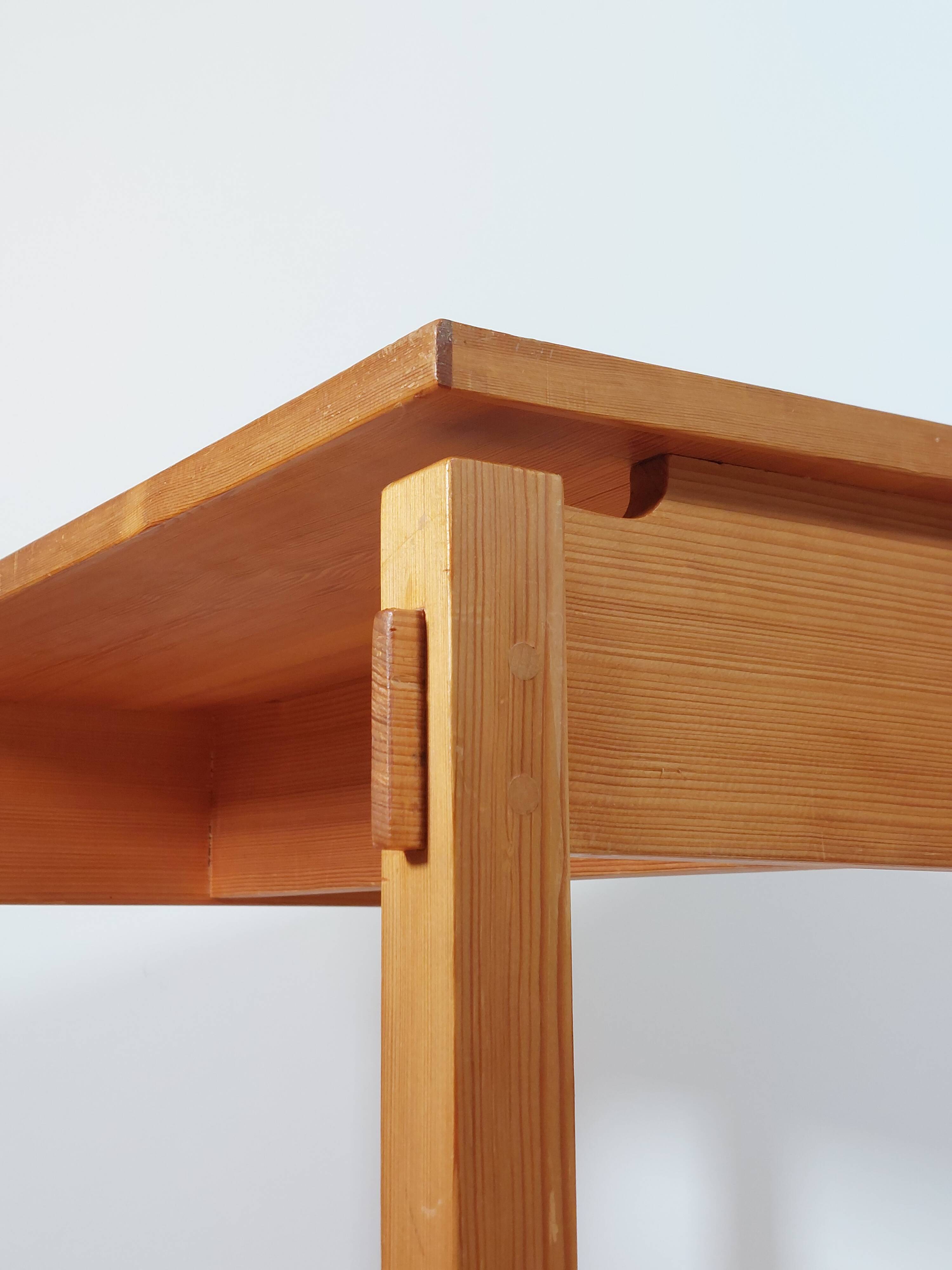 Meticulously crafted vintage pine side table, a masterpiece.