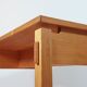 Meticulously crafted vintage pine side table, a masterpiece.