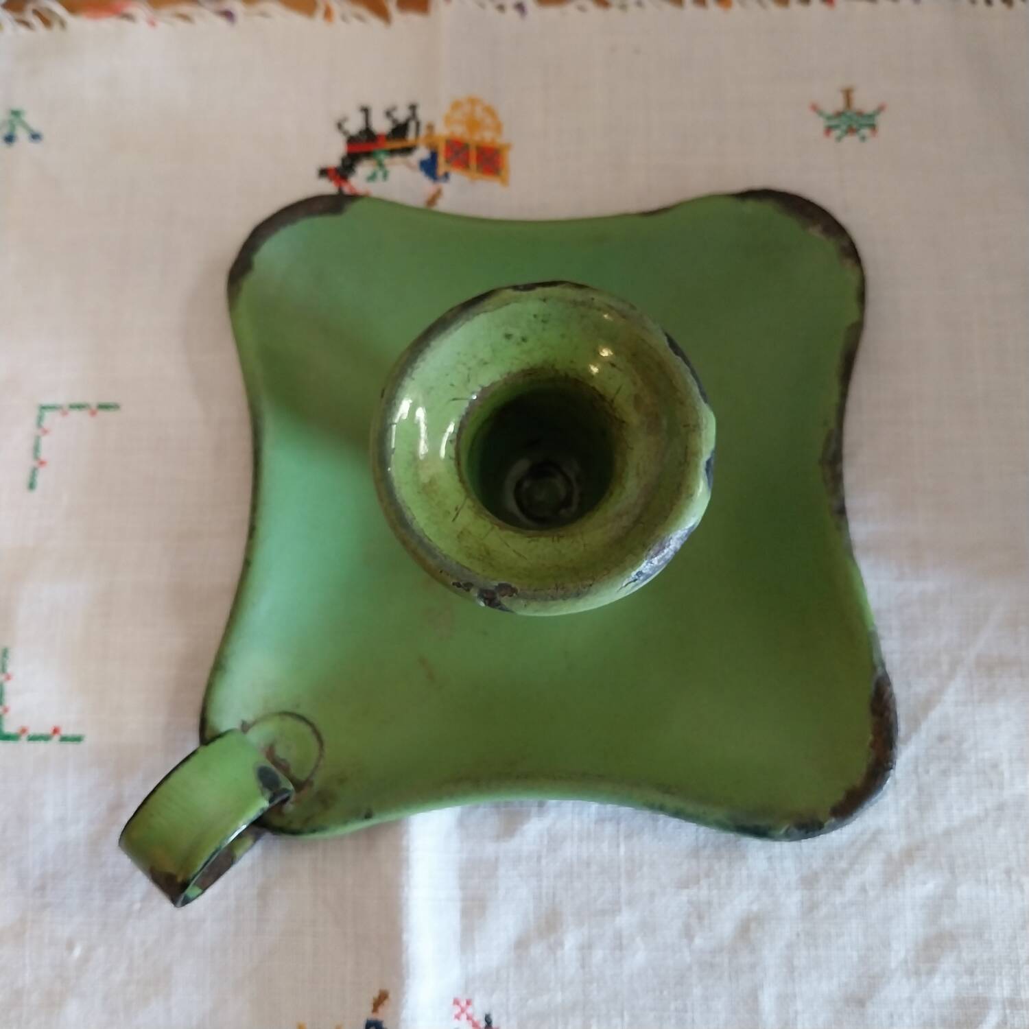 Old enamelled metal cellar rat candle holder