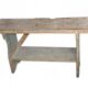 Small brown country bench in solid pine, from the period 1890-1919, rustic style.