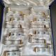 12 Limoges art porcelain knife rests in their case