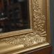 Important miroir en bois doré, style Restauration – Milieu XIXe