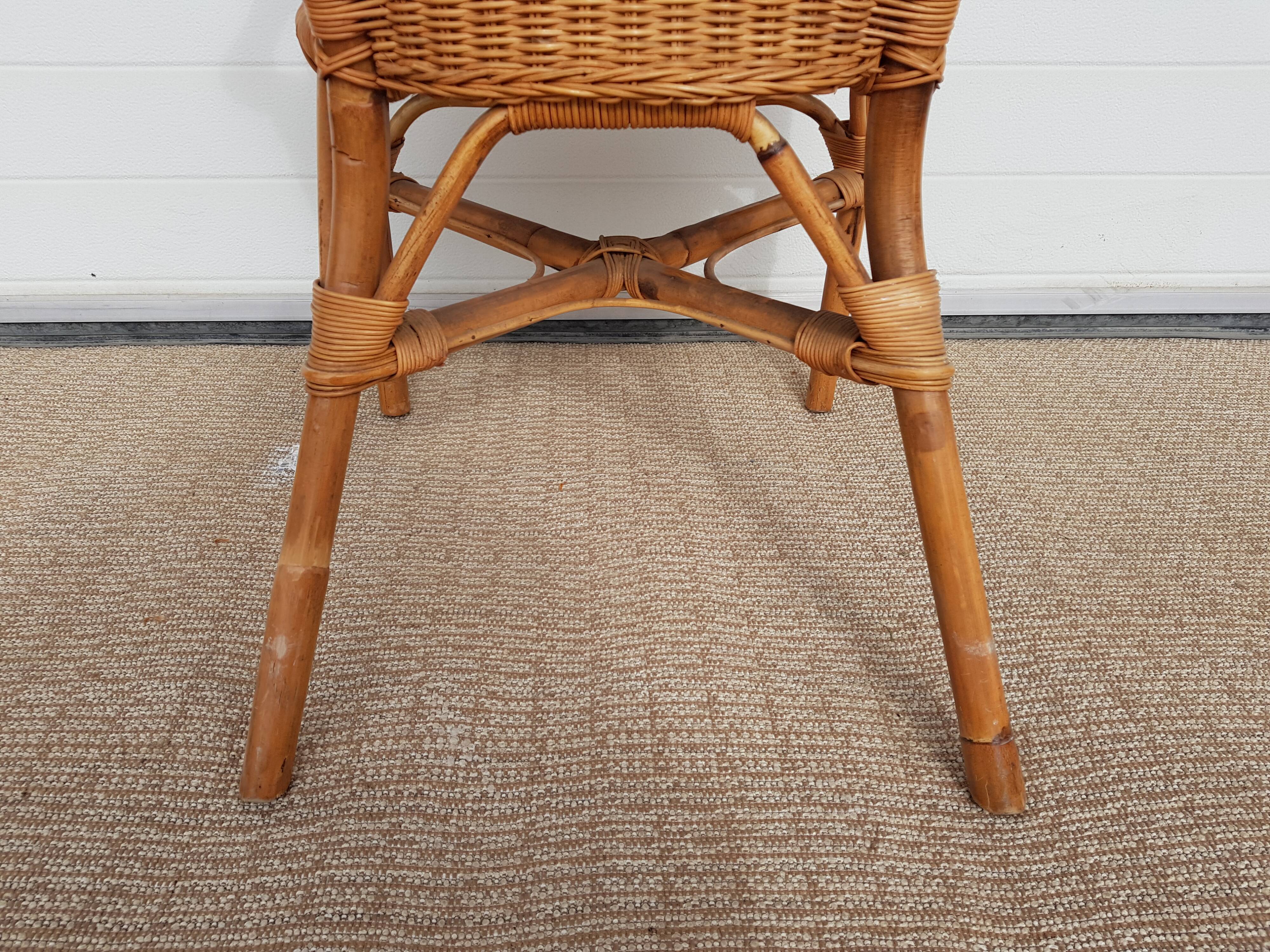 Old chair in bamboo 60s