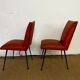 Pair of chairs in orange skaï