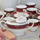 Elegant mid-century Japanese bone china service for 12 in white and noble red