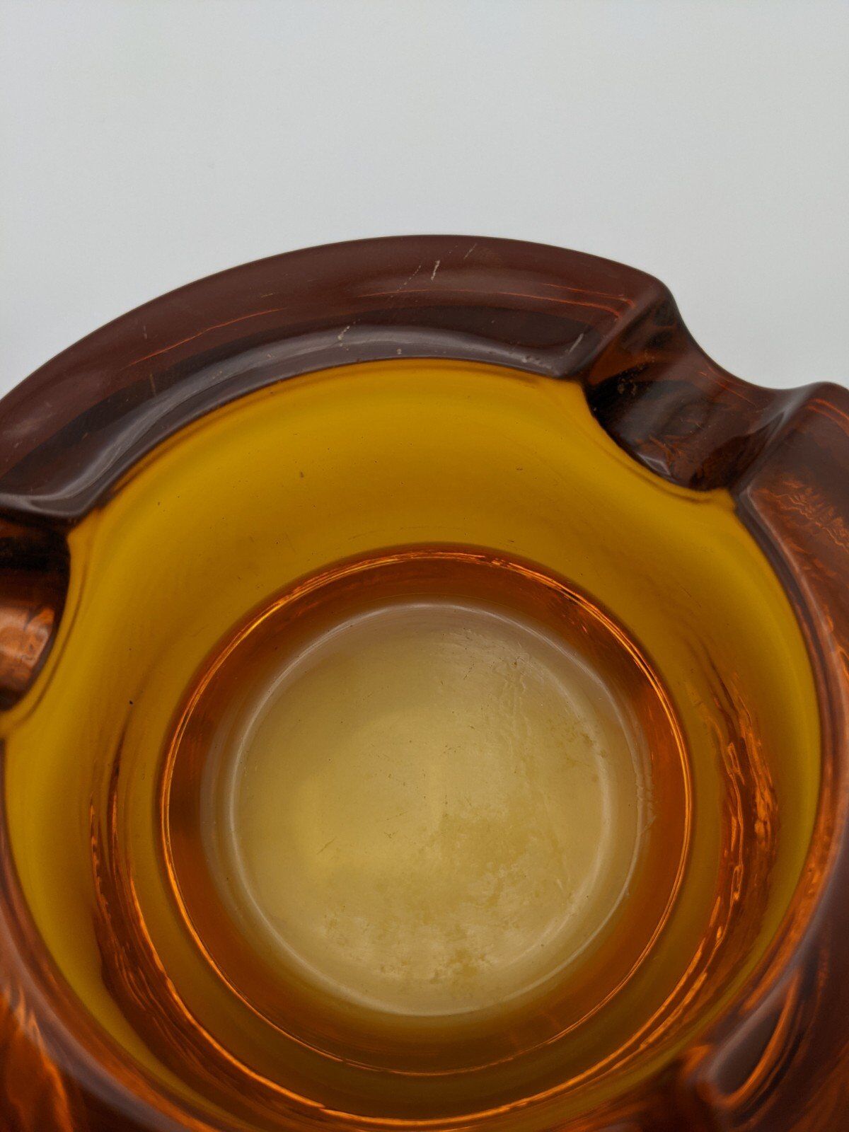 Amber glass ashtray 70s