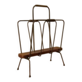 Vintage metal and wood magazine rack from the mid-20th century.