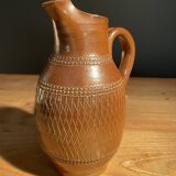 Chiseled terracotta pitcher