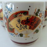 Far Eastern porcelain sake service consisting of a carafon and six cups