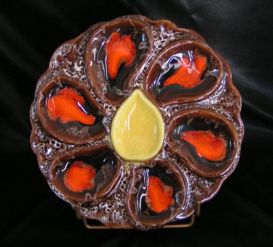 Service of 12 plates in oyster slip and its serving dish