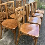(Lot) 13 Stamped Baumann Chairs