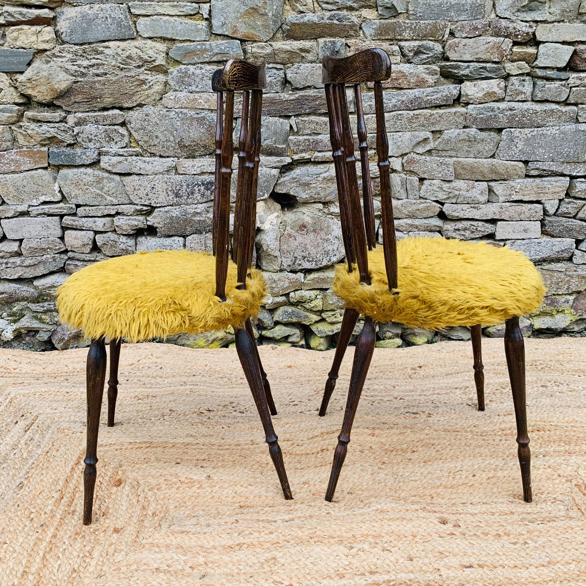 Pair of yellow moumoute chairs
