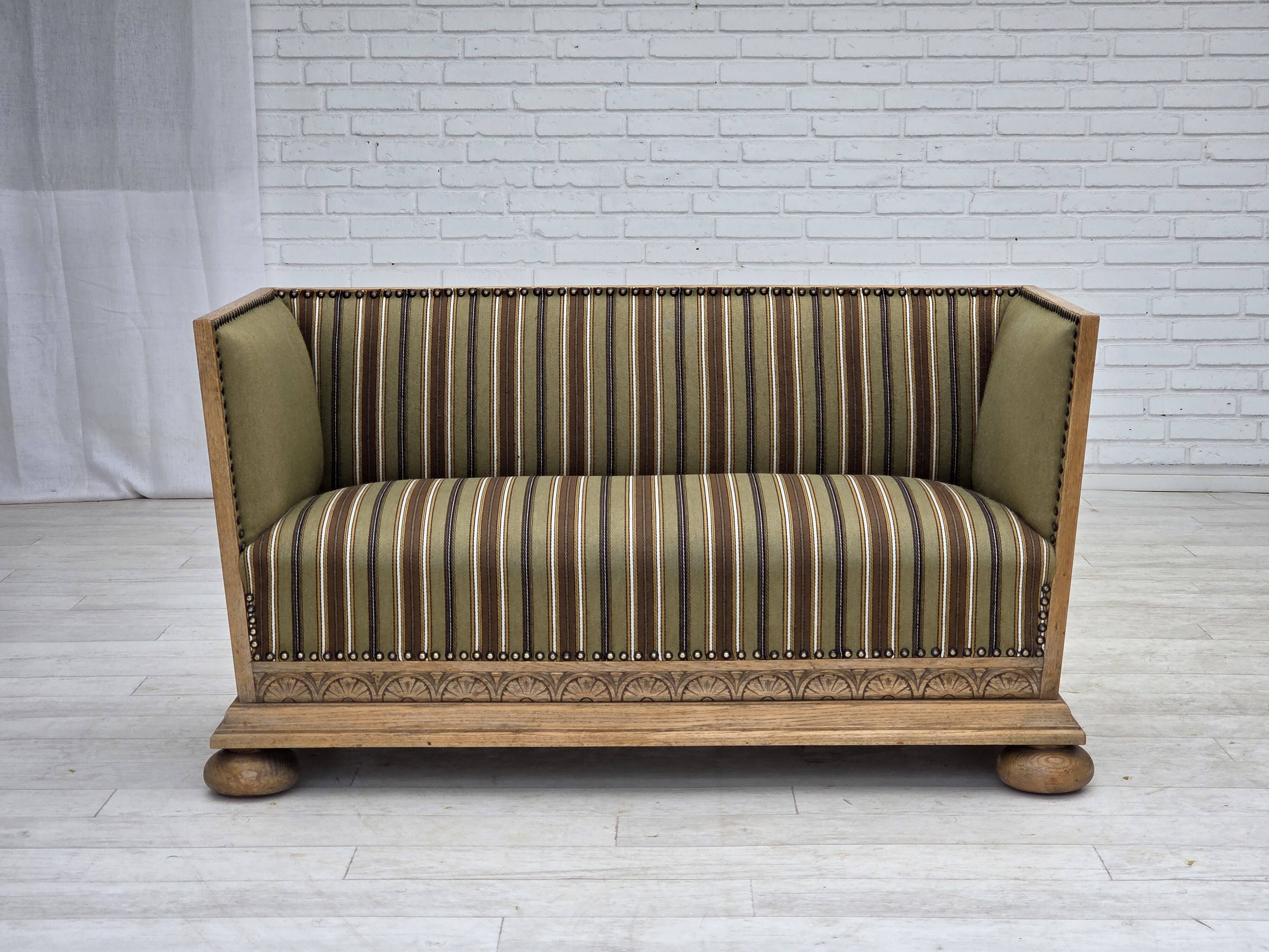 1950s, Danish 2-seater sofa, green furniture wool, oak wood.
