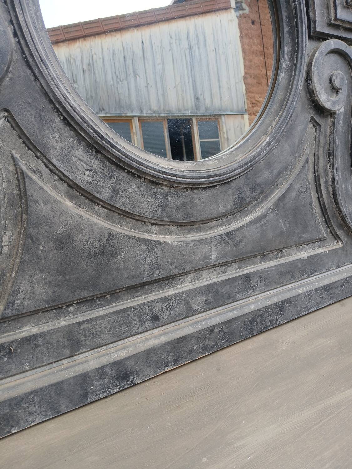 Wooden bull's-eye mirror
