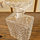 Rectangular whisky carafe made in France with geometric patterns.