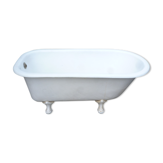 Old enamelled cast iron bathtub