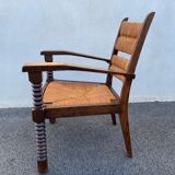 Vintage armchair in straw and brutalist wood