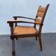 Vintage armchair in straw and brutalist wood