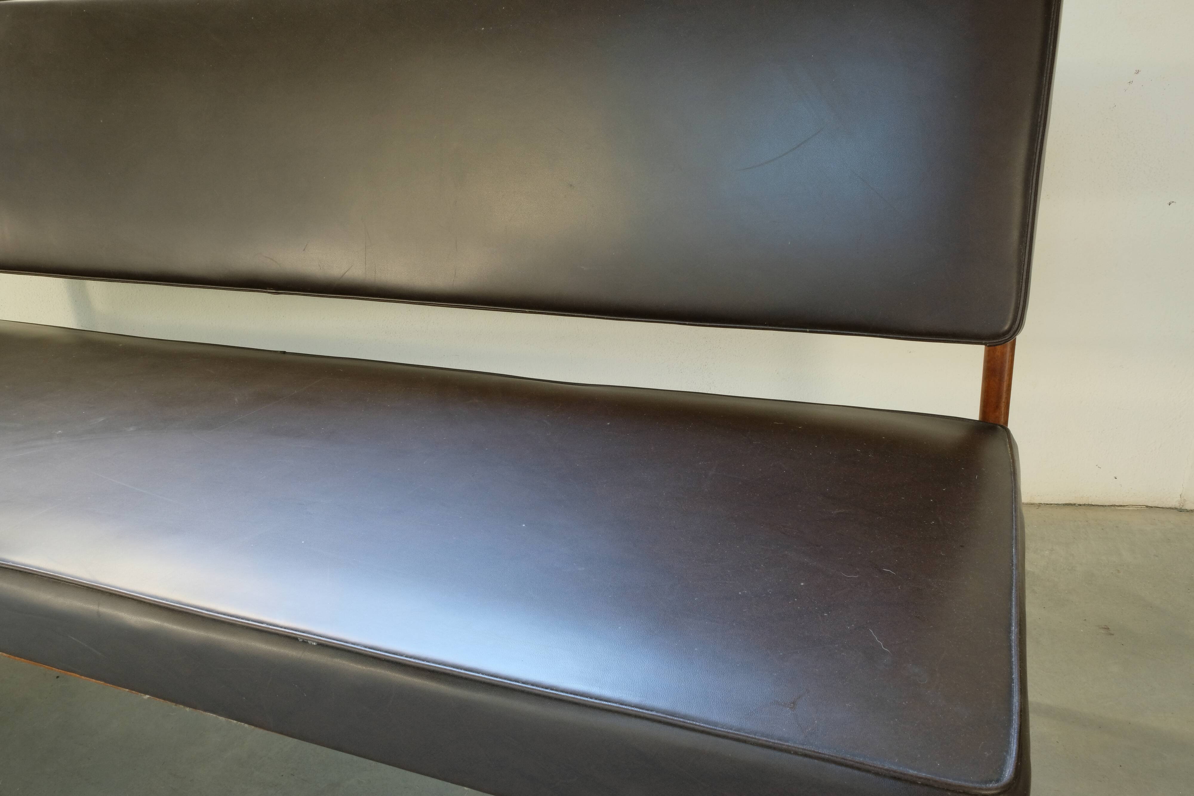 Sofa by Anonima Castelli in teak and skai, 1950s