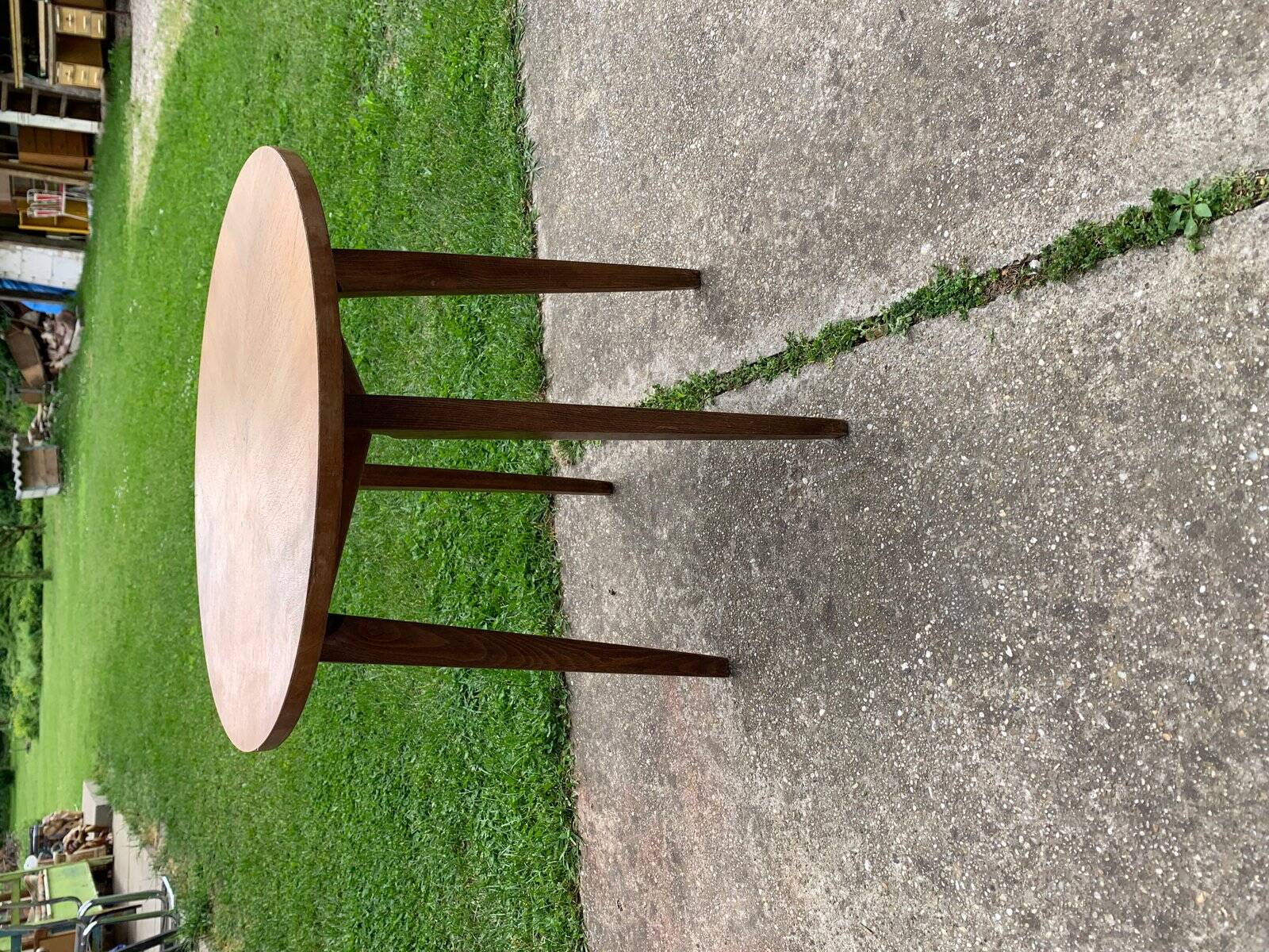 Mid-century brown side table in solid wood, 1960s tripod style.