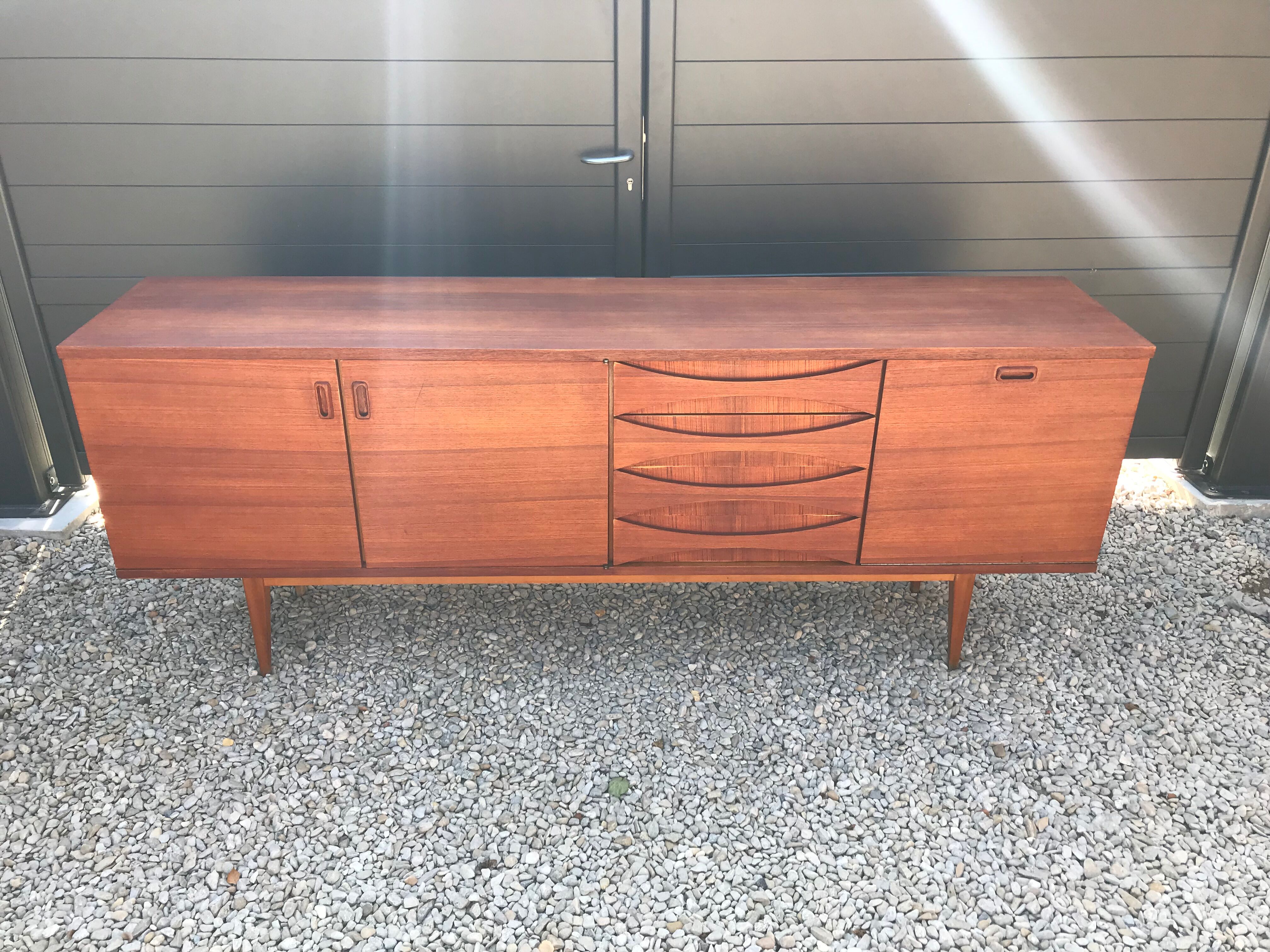 Eros row in scandinavian design teak