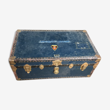 Large blue travel trunk