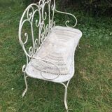 Banquette de jardin ancienne en fer forgé. Vers 1900