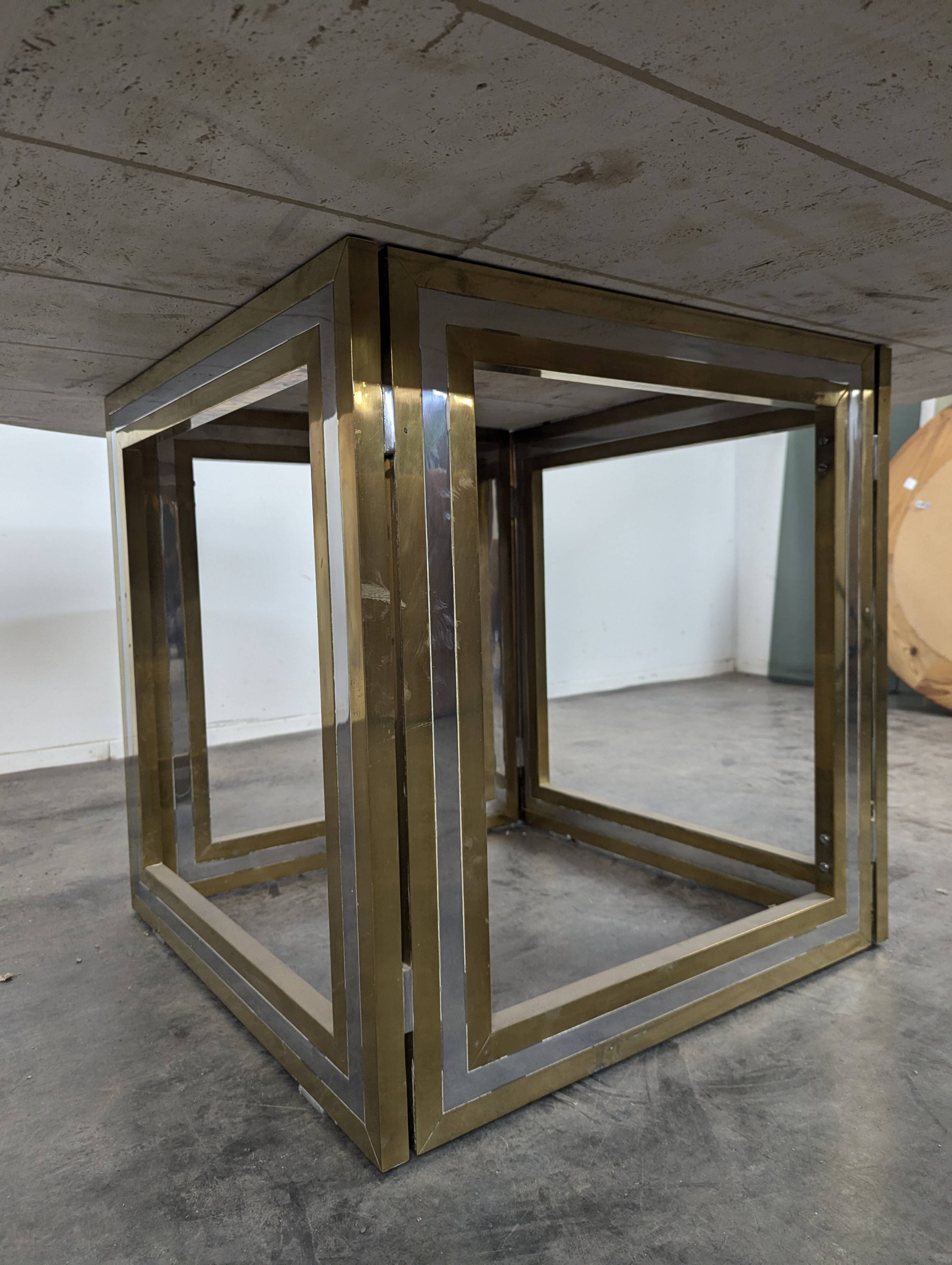 Italian dining table with a travertine top.