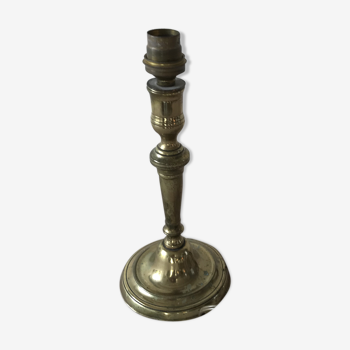 Brass candlestick mounted in lamp
