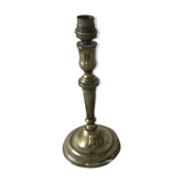 Brass candlestick mounted in lamp