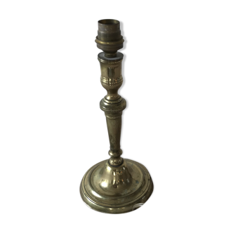 Brass candlestick mounted in lamp