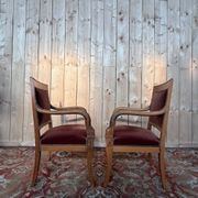 Paire de fauteuils style Empire – Accoudoirs dauphins – Hêtre et velours