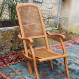 Cane folding armchair in solid wood