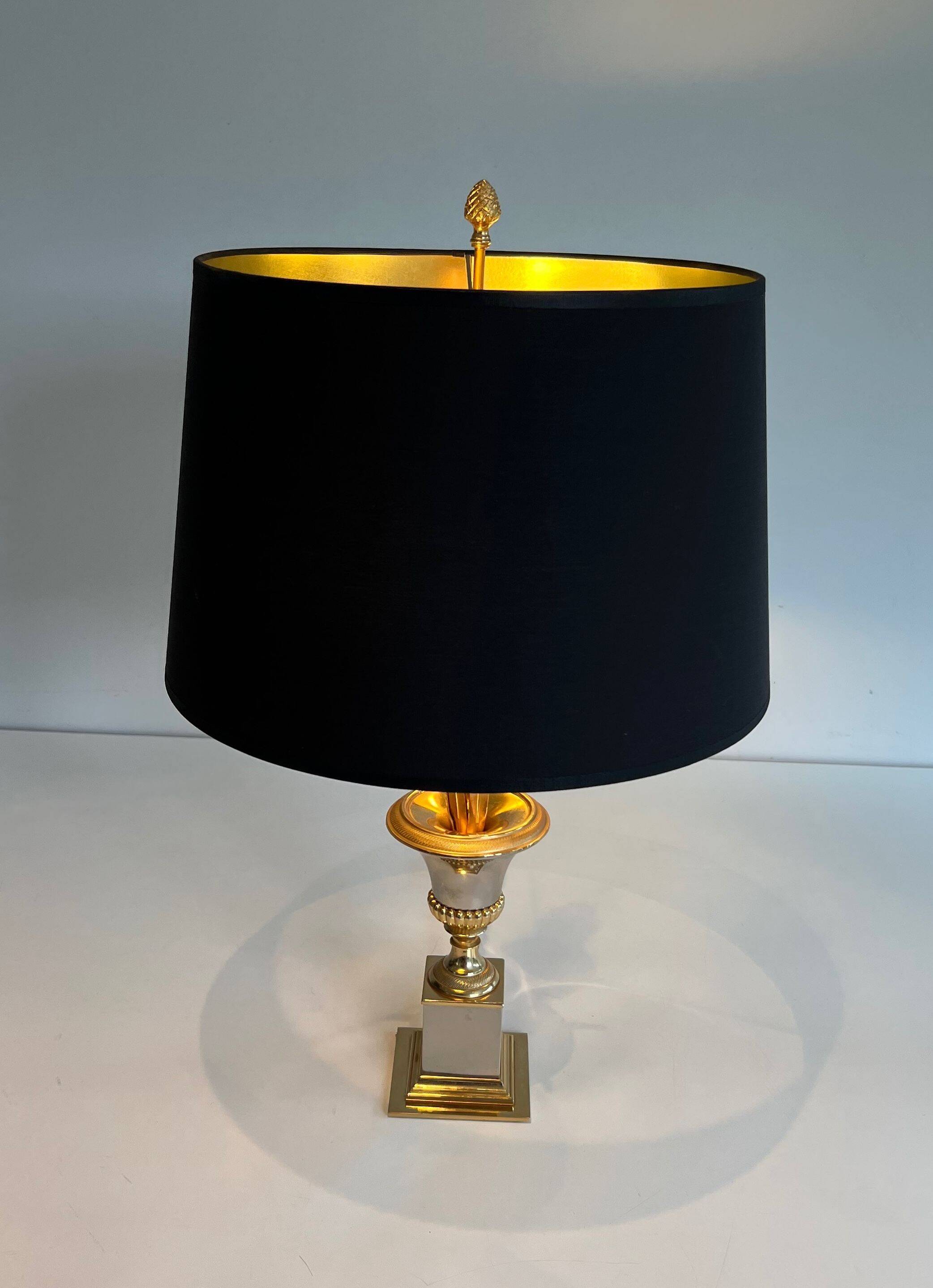 Pair of palm lamps in chrome and brass in the style of Maison Charles. Circa 1970.