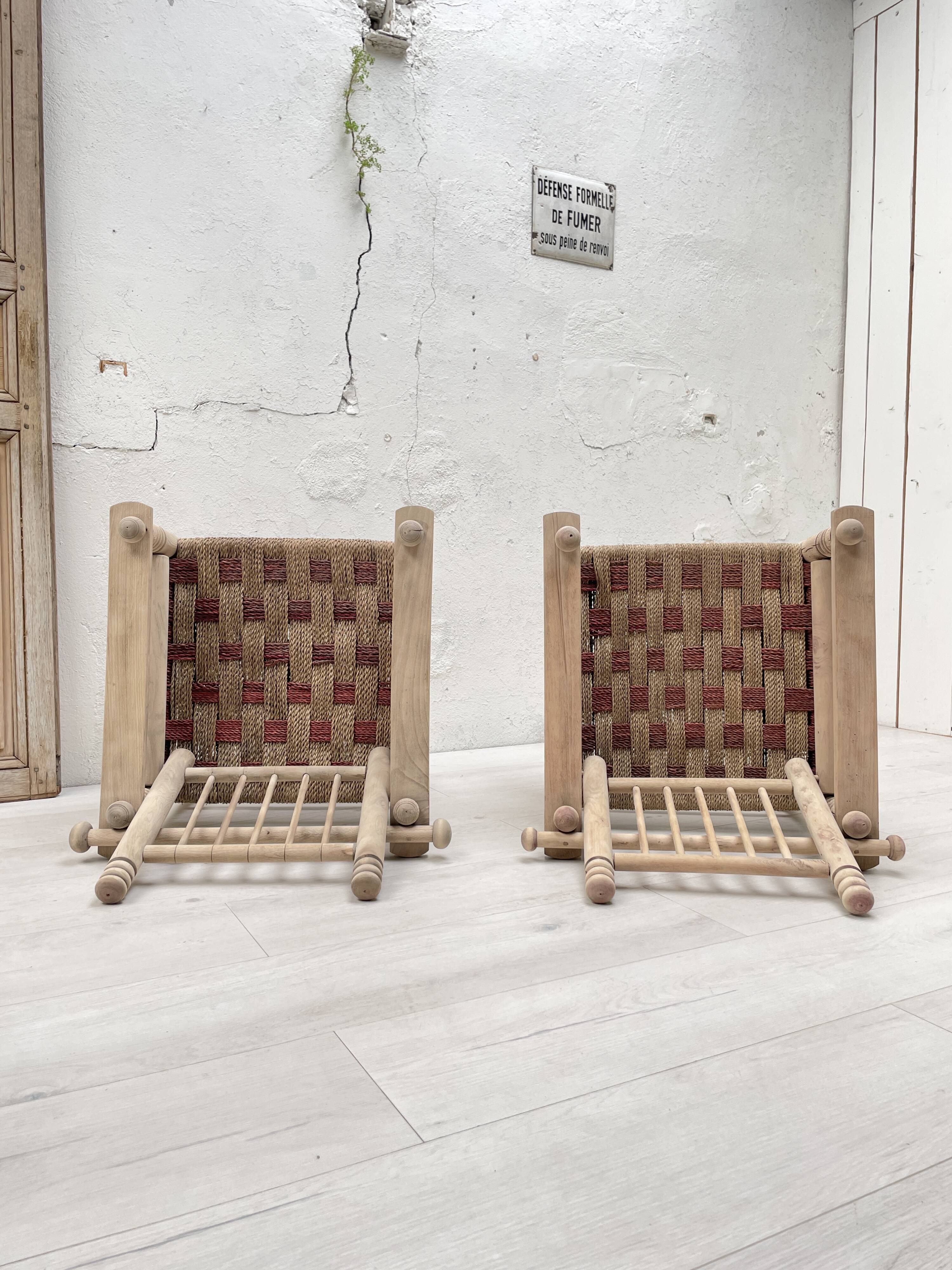 Pair of wooden armchairs and ropes