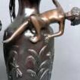 Pair of Art Nouveau vases in solid bronze.