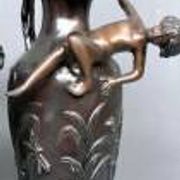 Pair of Art Nouveau vases in solid bronze.