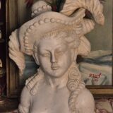 Bust of a woman with a hat