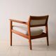 Upholstered armchair with teak frame