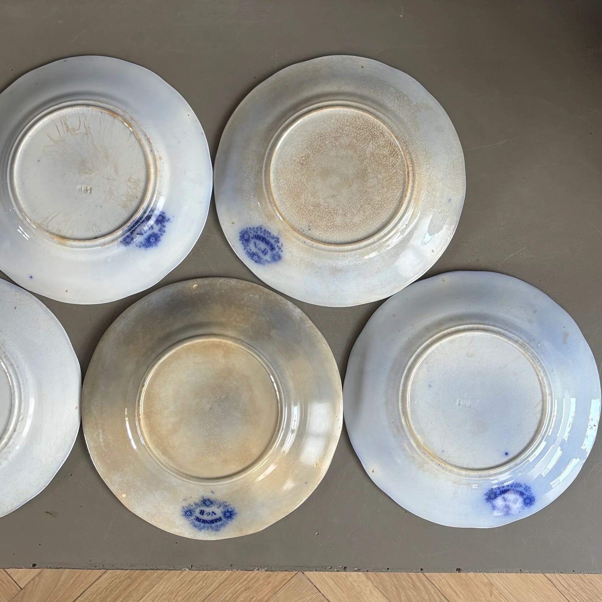 Stack of Sarreguemines plates, jardinière model.