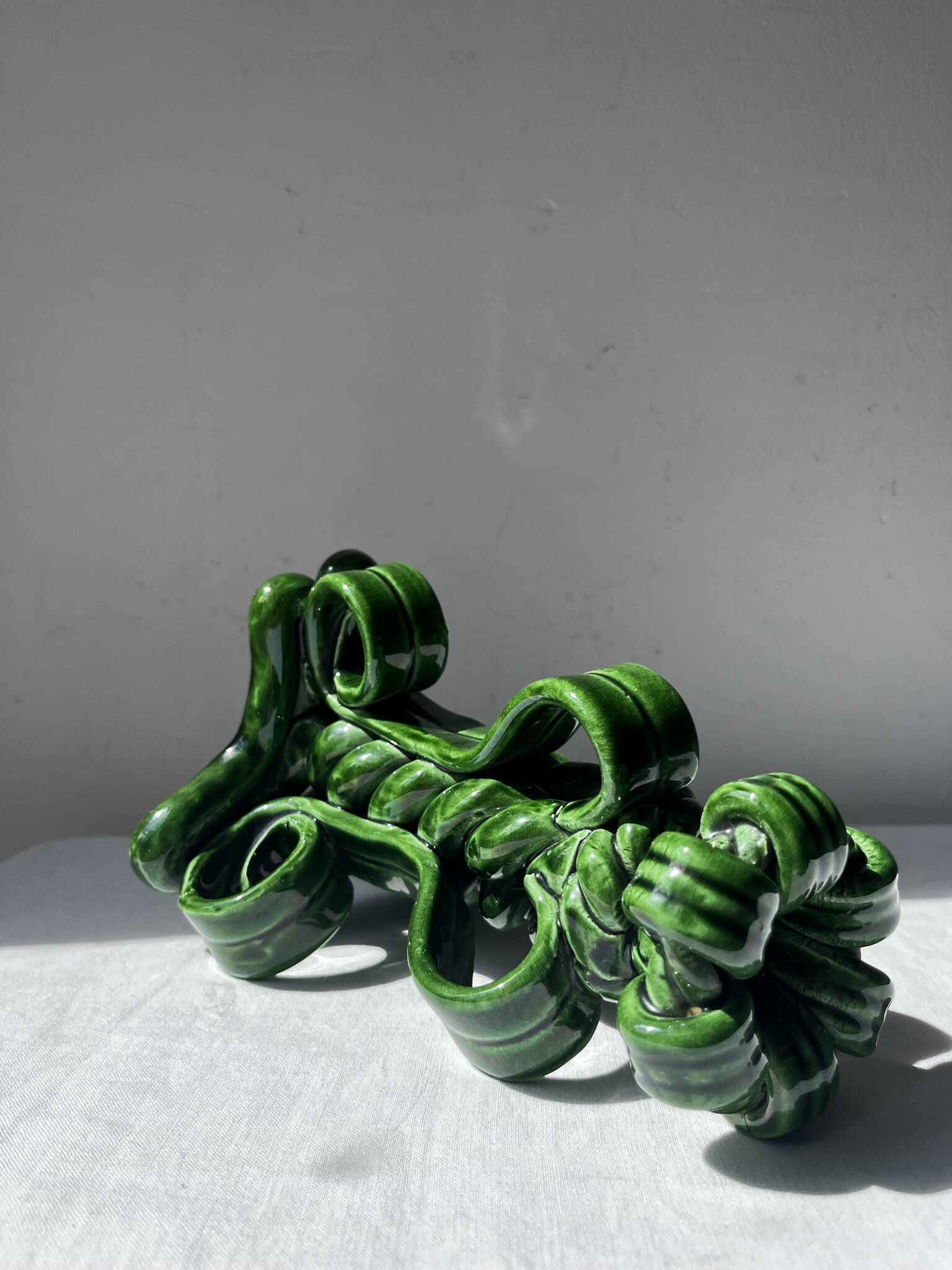 Lot of woven ceramic candle holders in green Vallauris.