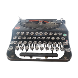 Machine à écrire ancienne remington portable