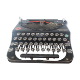 Machine à écrire ancienne remington portable