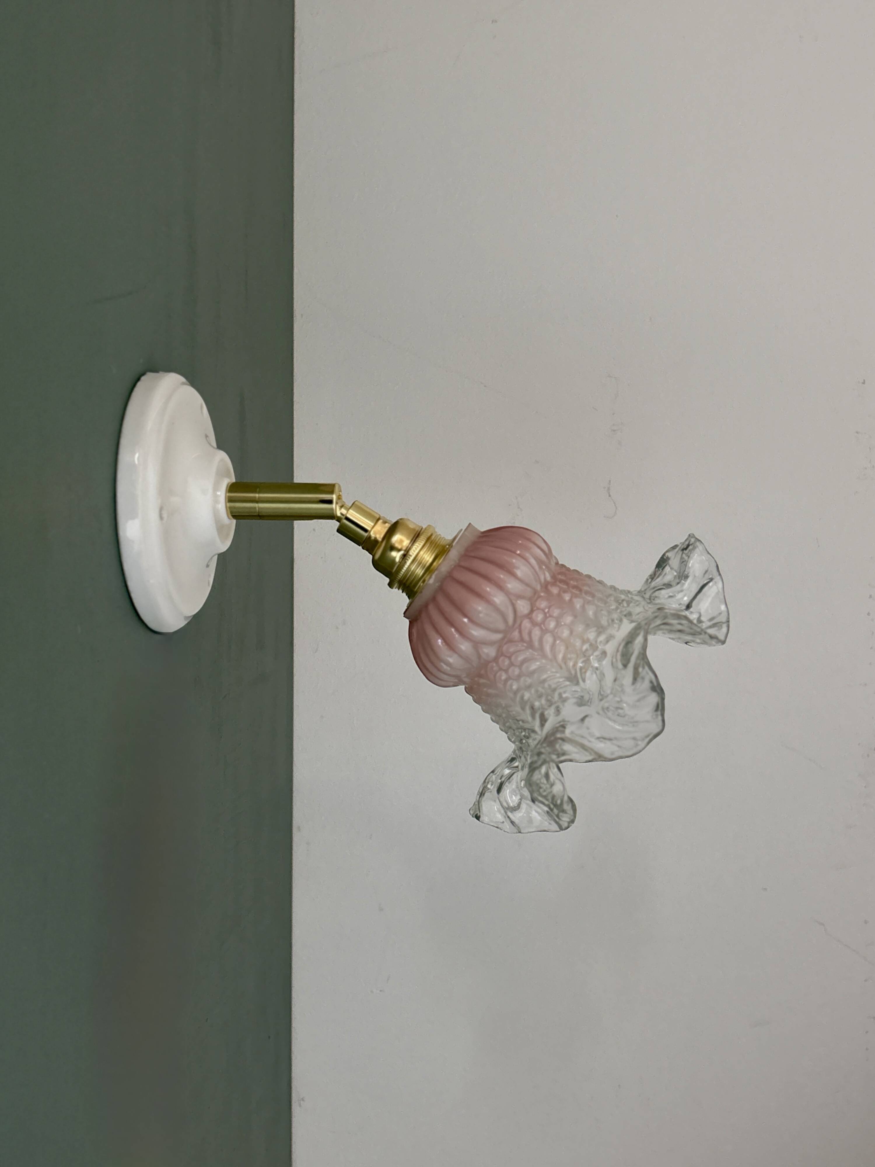 Vintage pink and clear glass tulip wall light.