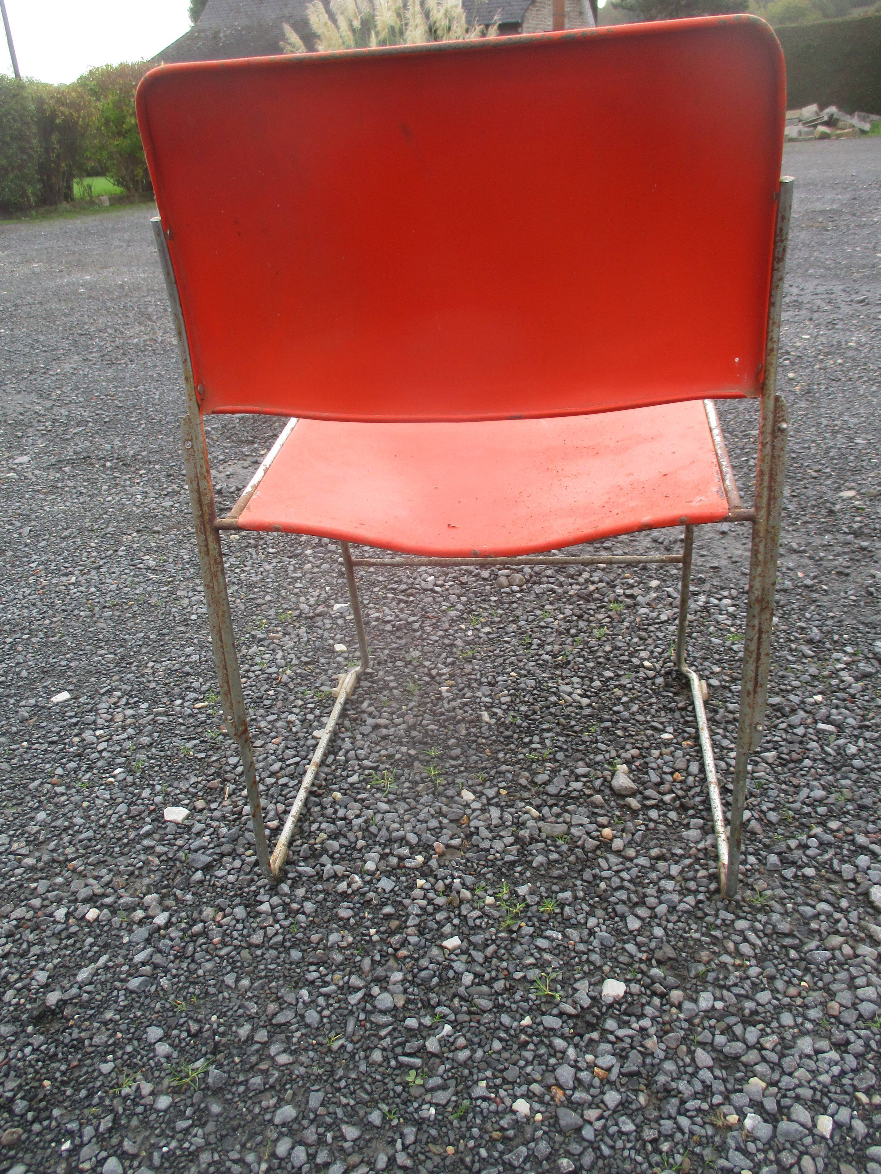 3 iron and plastic chairs