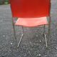 3 iron and plastic chairs