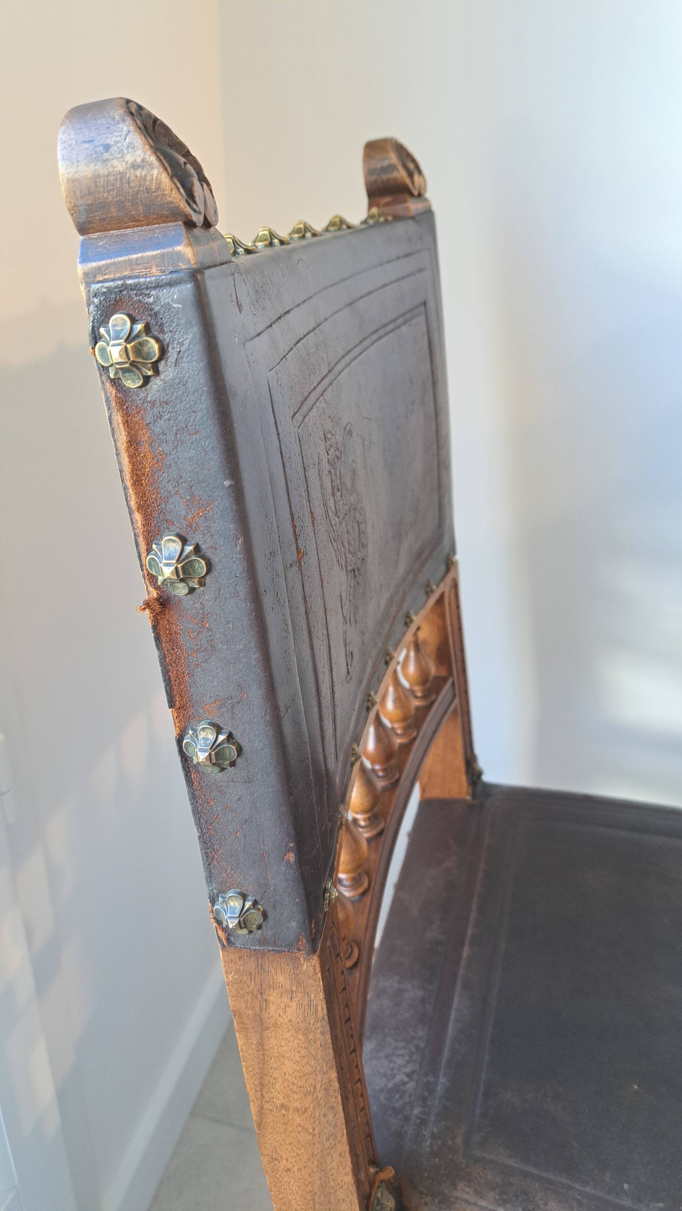 Pair of antique chairs in embossed leather, Henri II style.